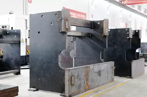 Real shot of the precision manufacturing of Osm bending machine frames, showcasing the CNC machining of high-strength mild steel frames and providing a comprehensive view of the entire quality control system for frames in standard sheet metal processing p