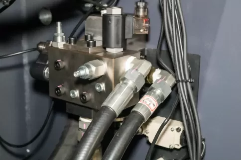 Close-up image of OSM industrial-grade bending machine precision hydraulic control valve - core component of dynamic flow regulation system - CNC machine tool hydraulic control unit - high-response energy-saving solution