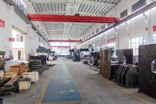 Overview of OSM machining workshop, showcasing high-precision machinery and a clean, organized production environment.