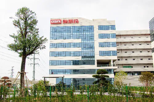 Exterior image of OSM comprehensive office building, showcasing a modern corporate workspace and company image.