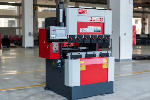 Close-up left front view of OSM OG-50III under-actuated hydraulic CNC press brake, showcasing machine details and high-precision design.