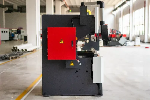 Close-up left side view of OSM OG-50III under-actuated hydraulic CNC press brake, highlighting machine details and robust structure.