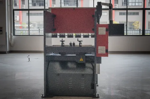 Close-up rear view of OSM OG-50III under-actuated hydraulic CNC press brake, highlighting machine structure and design details.