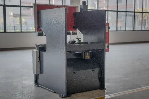 Close-up left rear view of OSM OG-50III under-actuated hydraulic CNC press brake, showcasing machine structure and design details.