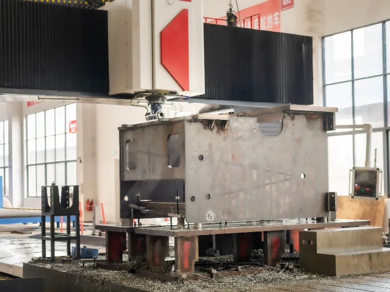 Gantry milling process in OSM press brake manufacturing, showcasing high-precision large-scale machining capabilities.