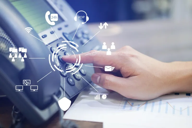 OSM after-sales service illustration showing a hand pressing the speakerphone button on a landline, symbolizing timely communication and customer support.