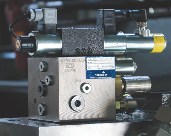 Close-up of German hydraulic system (HAWE AMB / Rexroth) used in OSM HP series CNC press brakes, ensuring efficient and stable machine performance.