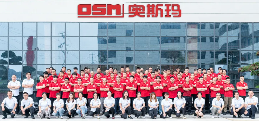 Group photo of OSM professional team, showcasing a well-organized and professional staff ensemble, reflecting the company’s proficiency in manufacturing and service alongside strong teamwork.