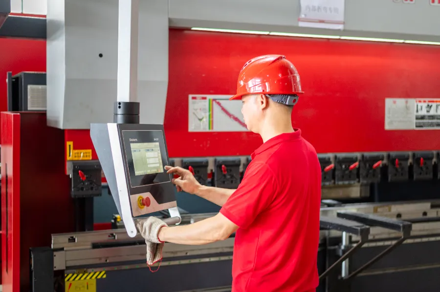 Photo of OSM’s post-sales on-site follow-up service in action, showing technicians visiting customers’ site to conduct product usage check and troubleshoot issues—highlighting the company’s commitment to ongoing customer care and service excellence.