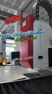 High-performance OSM single-sided laser cutting machine designed for high-speed metal fabrication. This industrial-grade equipment features a robust red and white design with a cable carrier, ensuring precision and efficiency for manufacturing workflows.